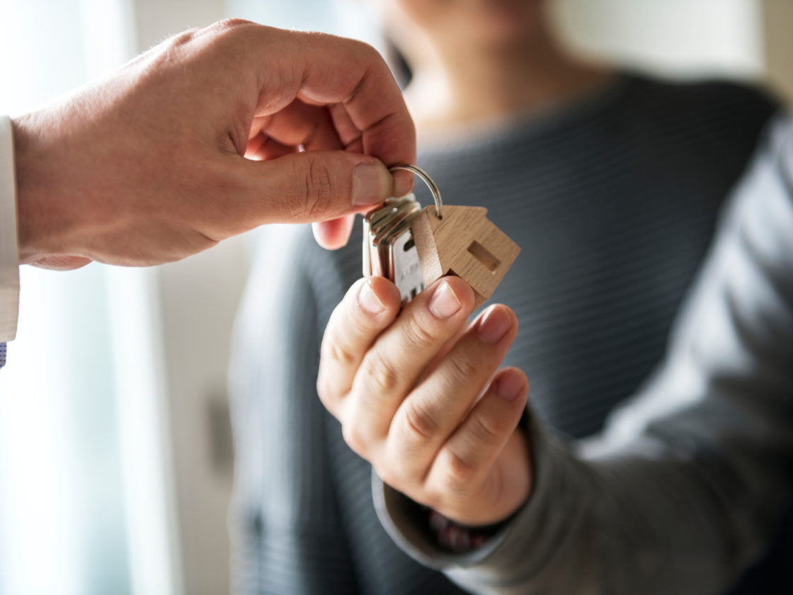 handing homeowners keys